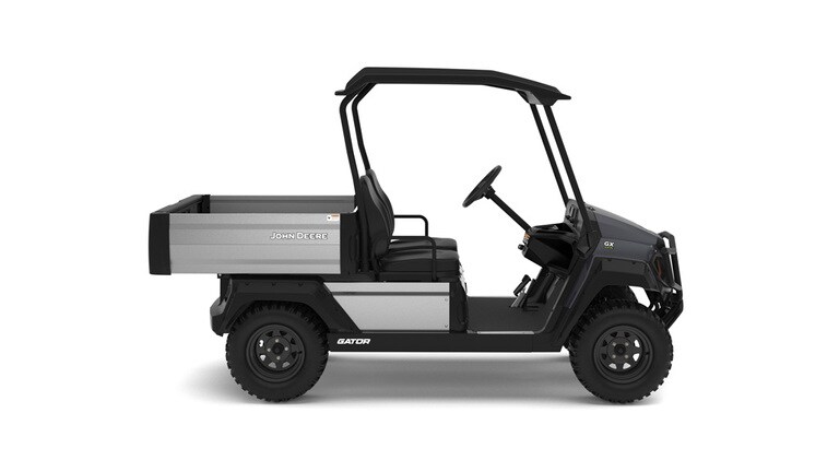A gray Gator with two seats and large cargo box facing right on a white background.