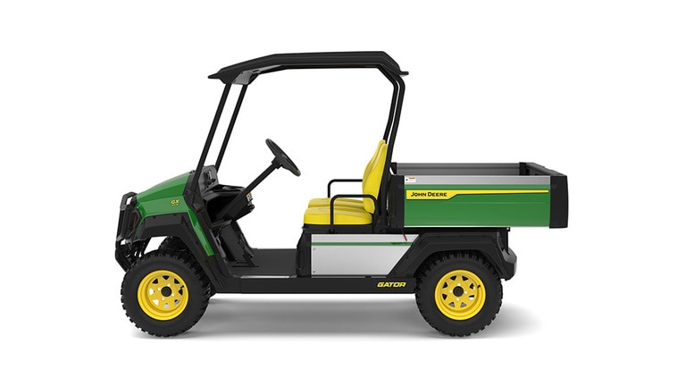 A green Gator with two yellow seats and large cargo box facing left on a white background.