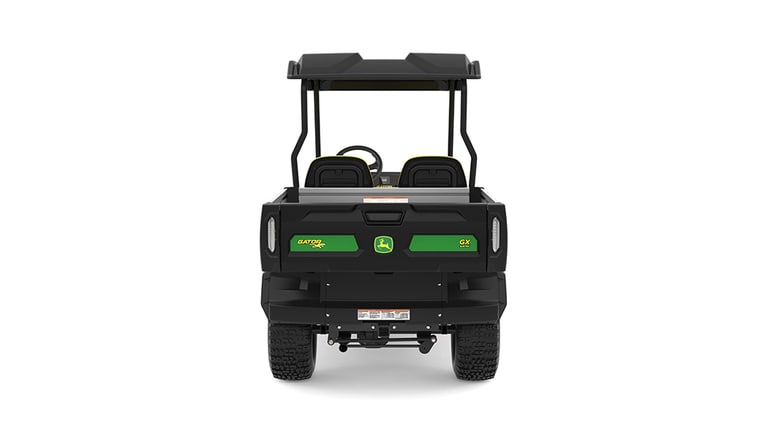 A green Gator with two yellow seats and large cargo box facing backward on a white background.