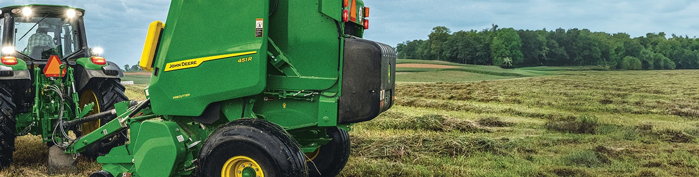 451R Round Baler in a hayfield. 