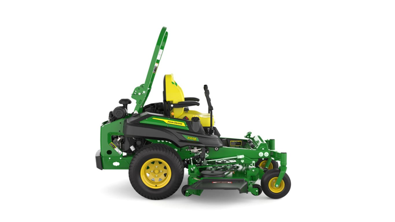 Right-side view of a green and yellow riding mower with roll bar, large rear wheels, and various controls