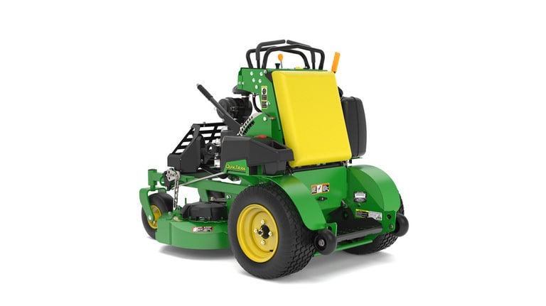 A rear-left-facing studio shot of a green and yellow standing mower on a white background.
