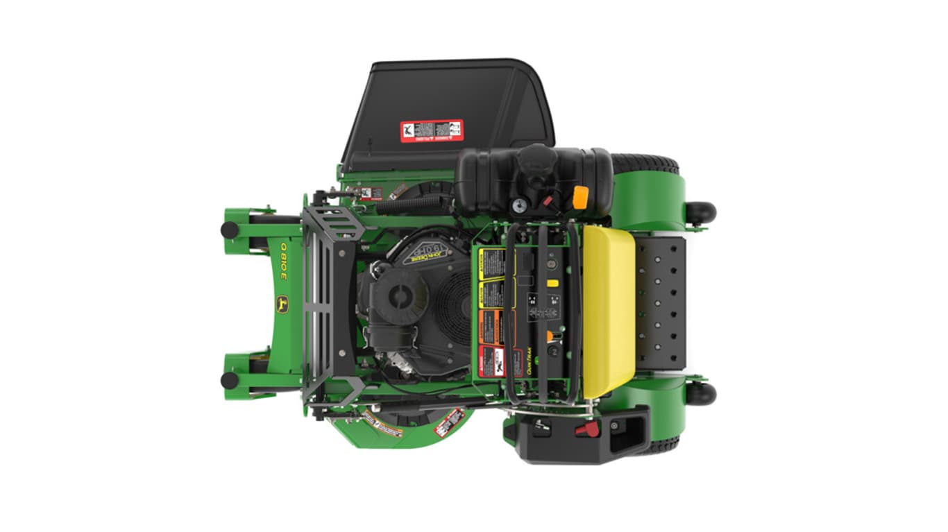 A top-facing studio shot of a green and yellow standing mower on a white background.