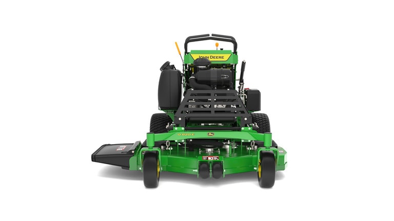 A front-facing studio shot of a green and yellow standing mower on a white background.