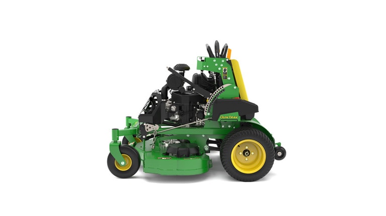 A left-facing studio shot of a green and yellow standing mower on a white background.