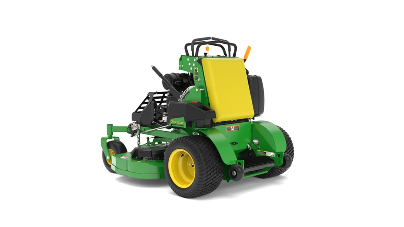 A rear-left-facing studio shot of a green and yellow standing mower on a white background.