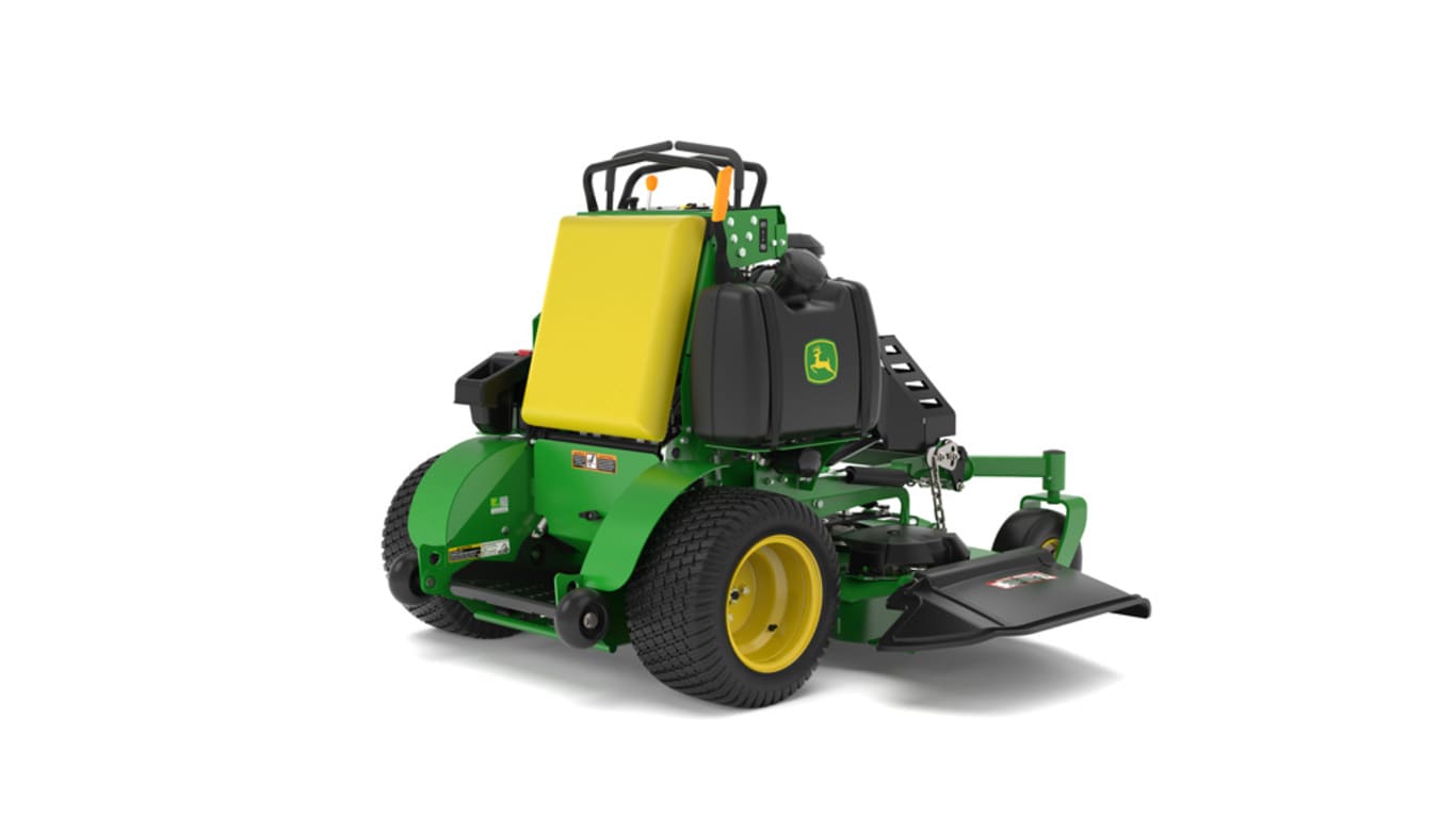 A rear-right-facing studio shot of a green and yellow standing mower on a white background.