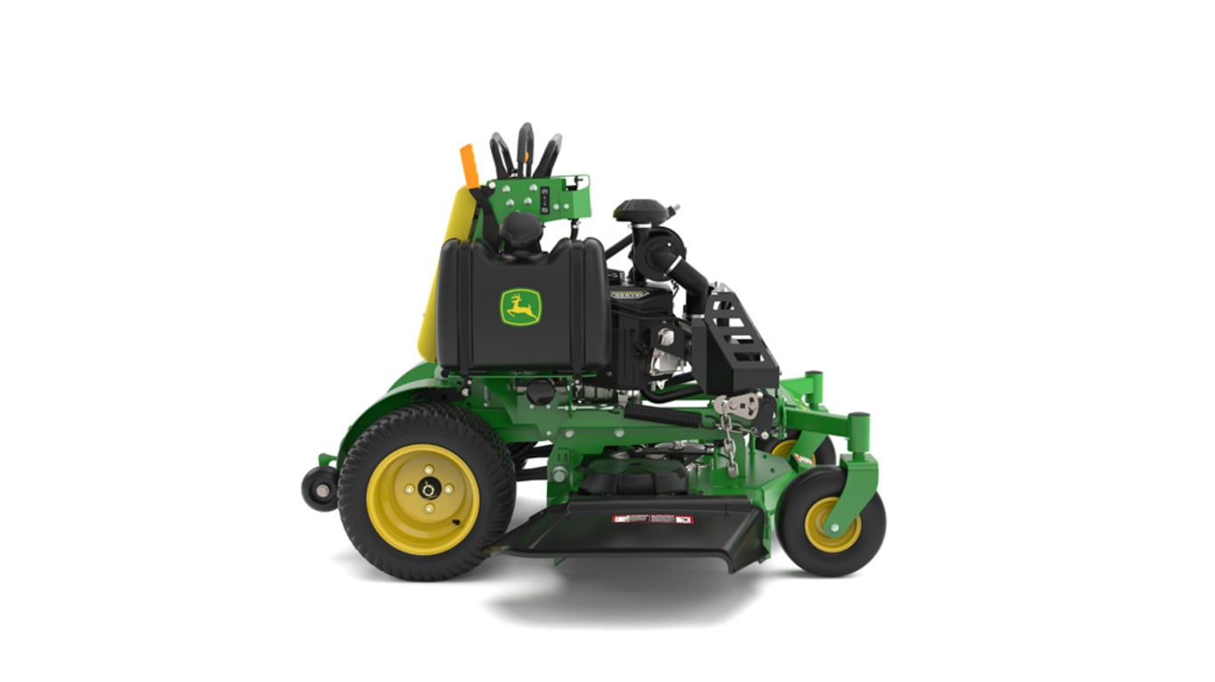A right-facing studio shot of a green and yellow standing mower on a white background.