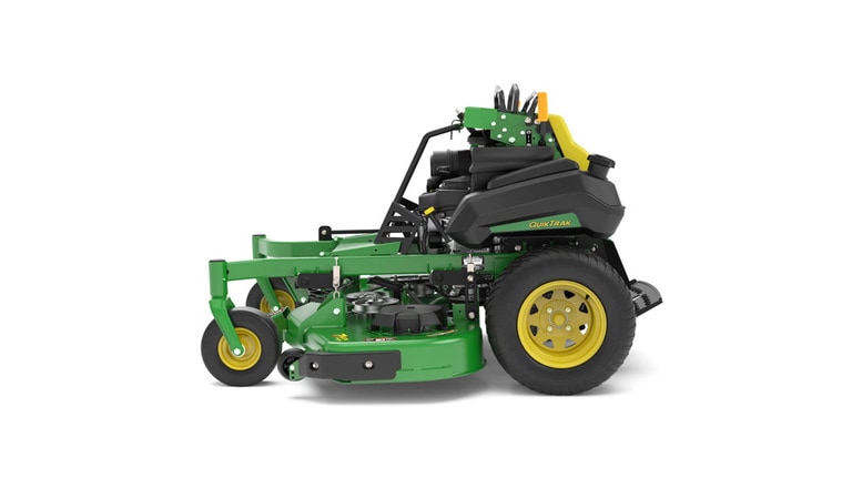 A left-facing studio shot of a green and yellow standing mower on a white background.
