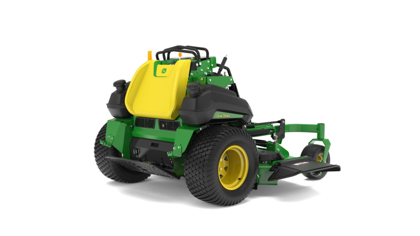 A rear-right-facing studio shot of a green and yellow standing mower on a white background.