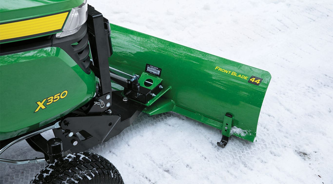 An X350 Mower with a Snowplow attachment