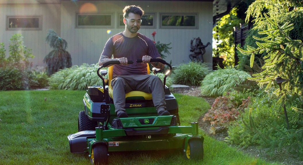 Person mowing grass on Z370R Zero-turn mower