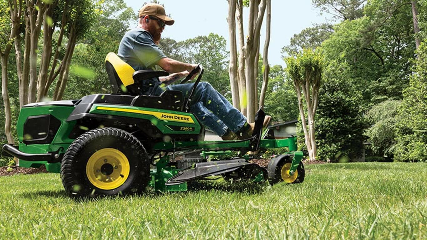 Person cutting grass on Z380R