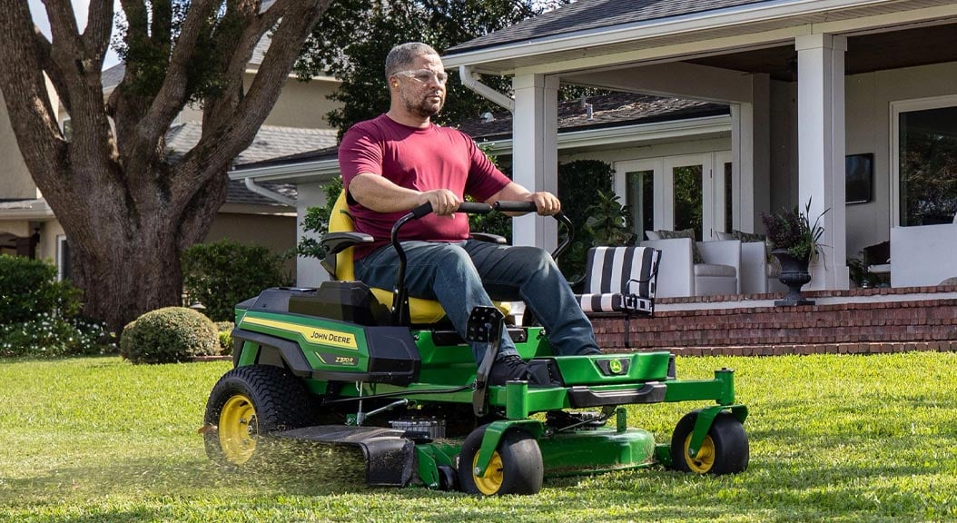 Person mowing grass on a Z370R Zero-Turn mower