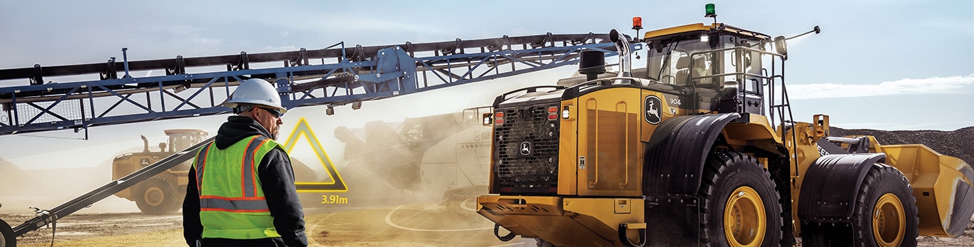 John deere construction vehicle leveling the dirt