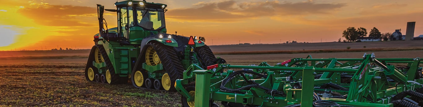 Large tractor pulling a tillage implement