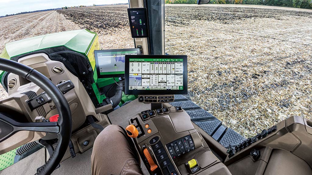 Operator looking to right in cab of 9RX 830