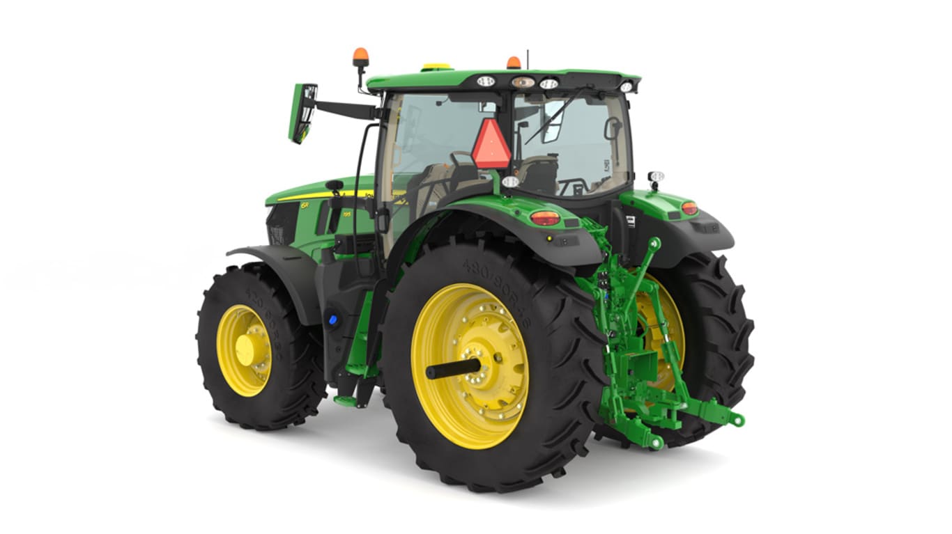 Studio image of the rear left side view of a green 6R 195 Row Crop Tractor.