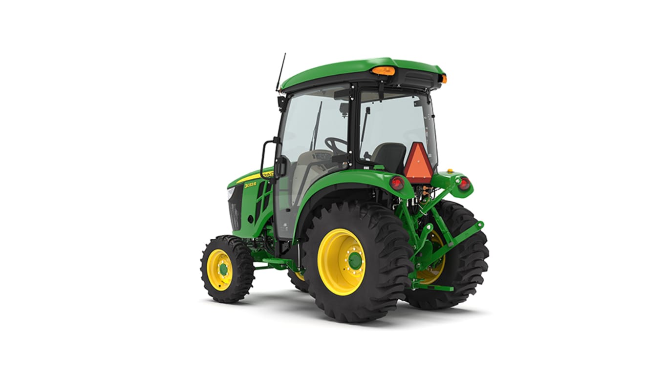 Rear left-facing 3033R Compact Tractor on a white background