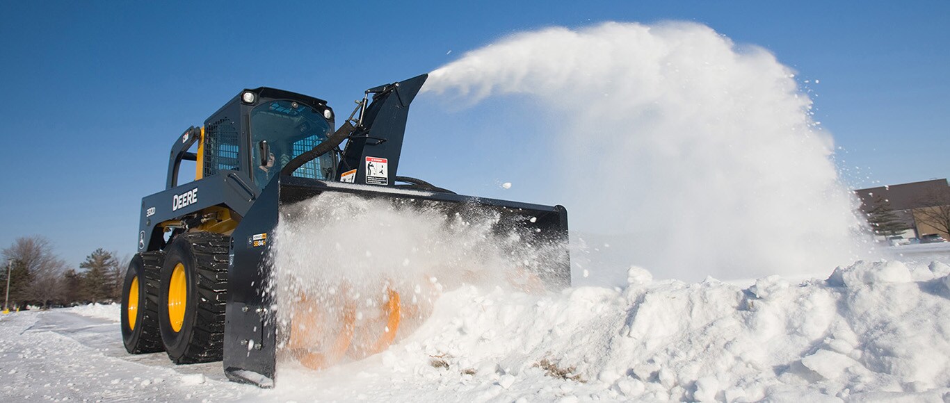 Skid Steer with snow blower attachment