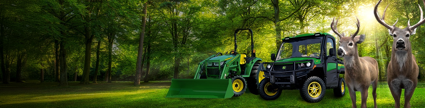 Two deer—one on the left next to a tractor, one on the right next to a Gator Utility Vehicle—in between a Deere Season logo.