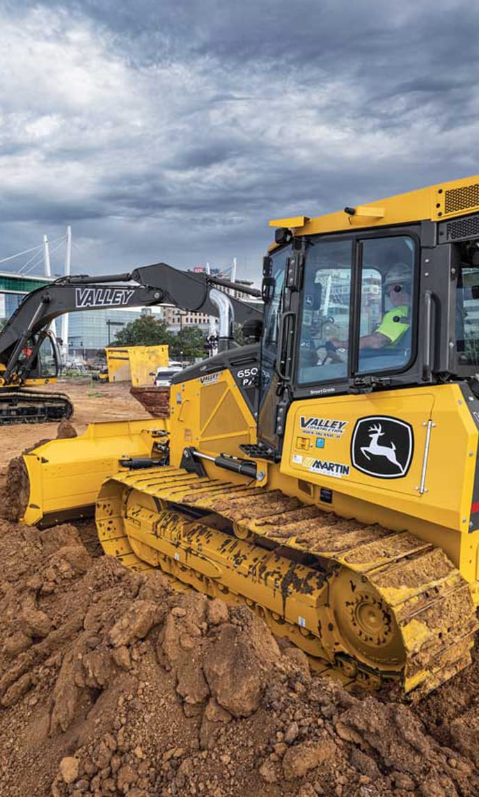 Valley Construction equipment works on a jobsite