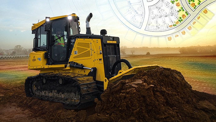 A John Deere 700L XLT SmartGrade Dozer carves out swales and slopes while grading roads and building pads for the housing-development site.