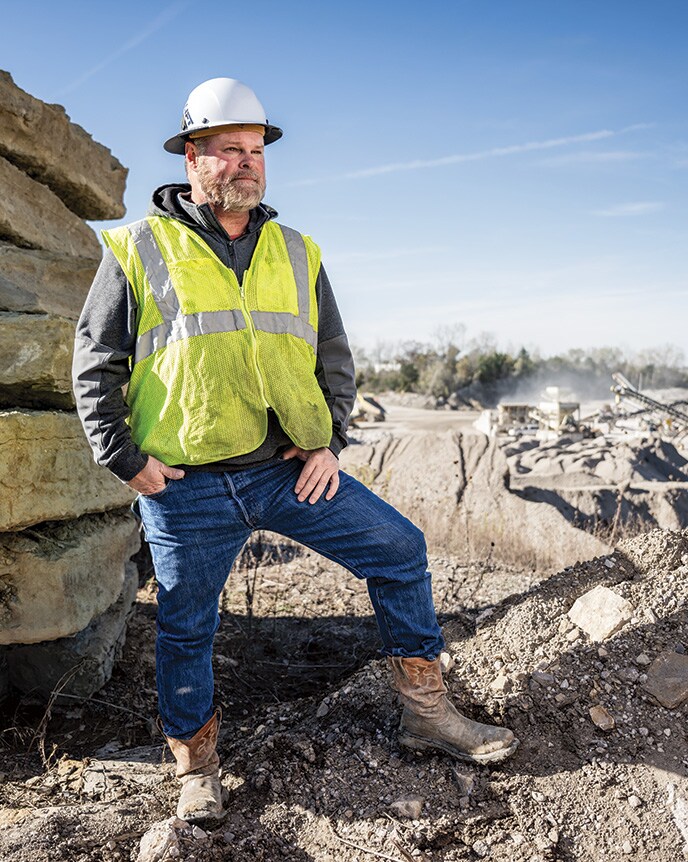 General Manager Tracy Link watches the action around him at a Rockridge Quarry site.