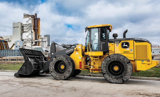 A John Deere 644X-Tier Wheel Loader is parked outside the Arnold O. Chantland Resource Recovery Plant