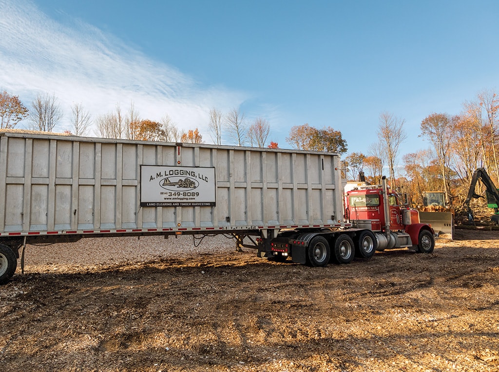 A.M. Logging tractor and trailer