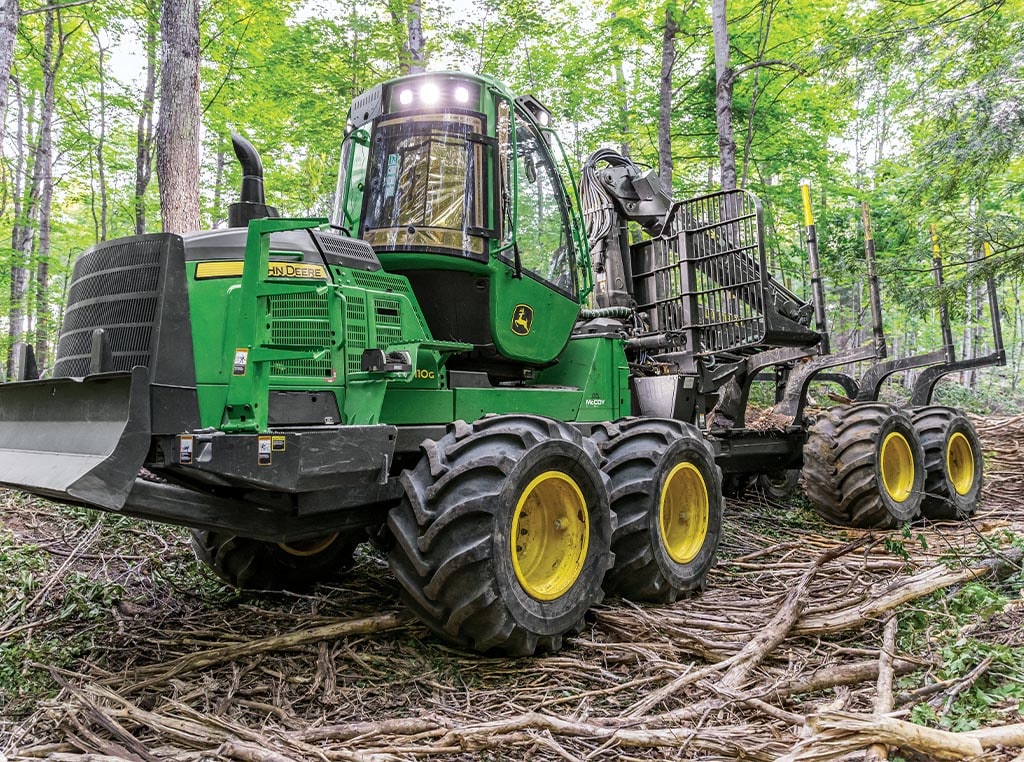An 1110G Forwarder sits on a Harju Logging site with no operator.