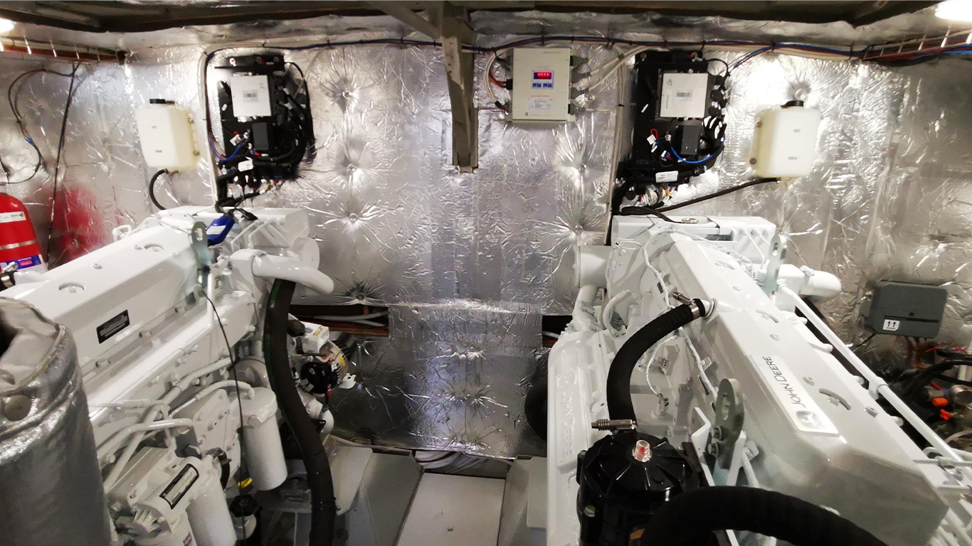 Inside of Artemisia’s engine room showing its two 13.5L John Deere marine engines