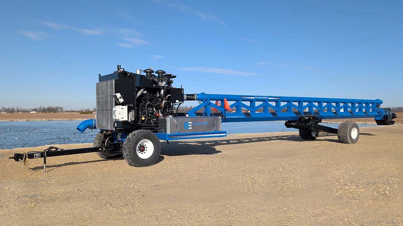 Bambauer Equipment’s The Big Stick liquid manure pump next to a lagoon.