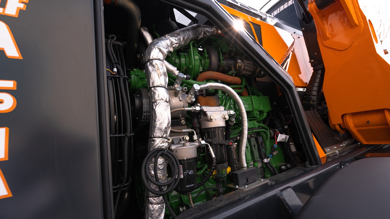 A John Deere 4.5L industrial engine inside Energreen's tool carrier