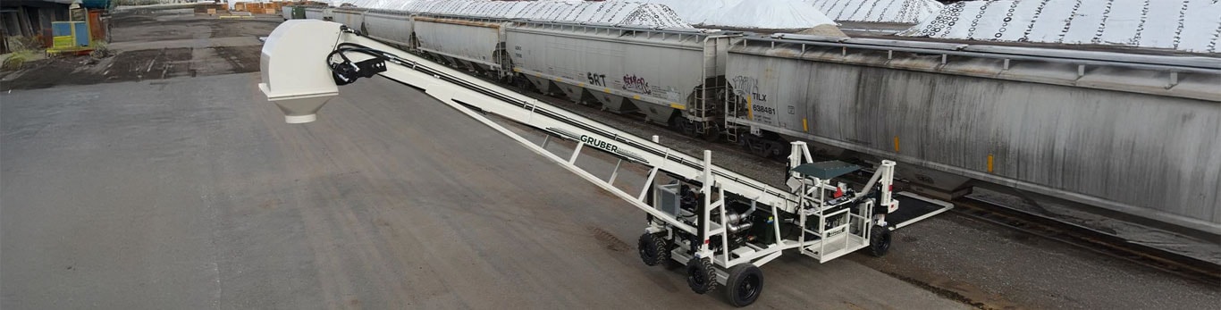 Gruber Manufacturing material conveyor on a jobsite.