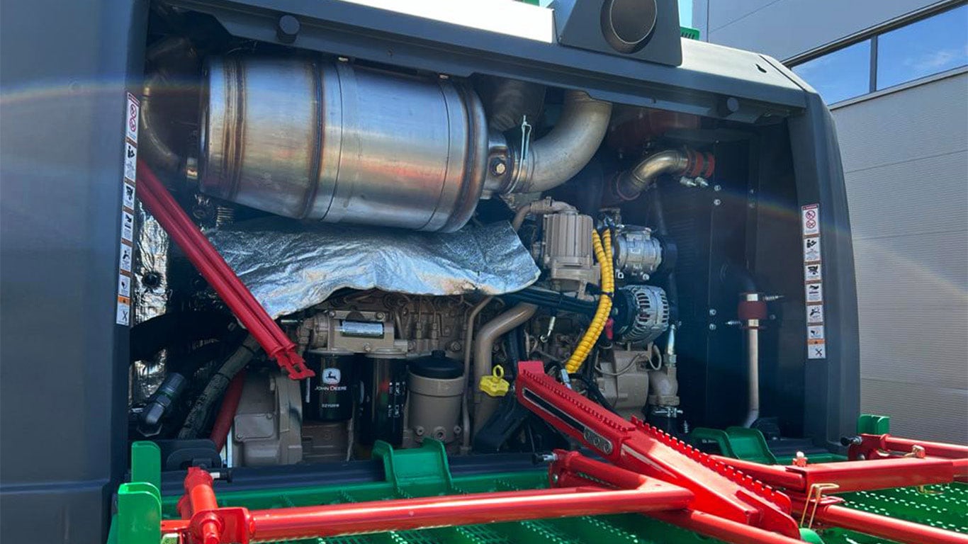 A John Deere industrial engine in a Neuson Forest harvester.