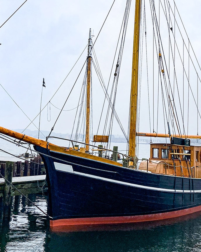 Petersen Tegl’s wooden sailing ship docked in the harbor