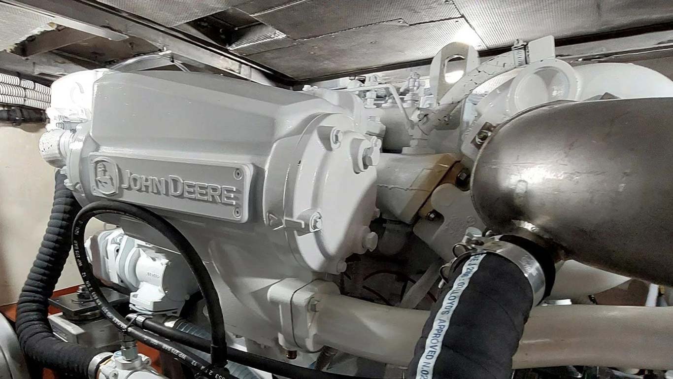 The John Deere 9.0L marine engine in the engine room of the Capax patrol vessel.