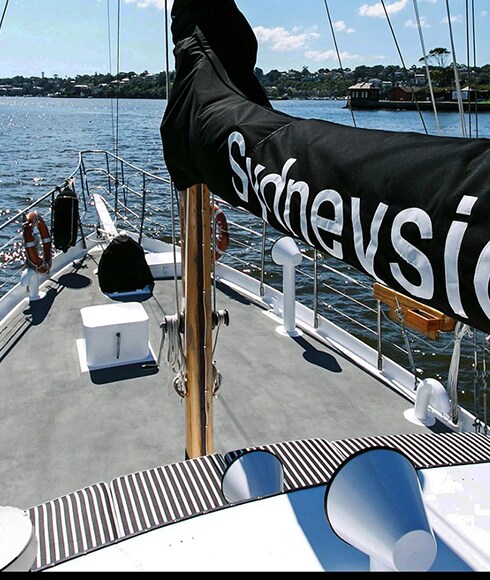 The bow of Sydneysider Charter Boat overlooking the Sydney Harbor