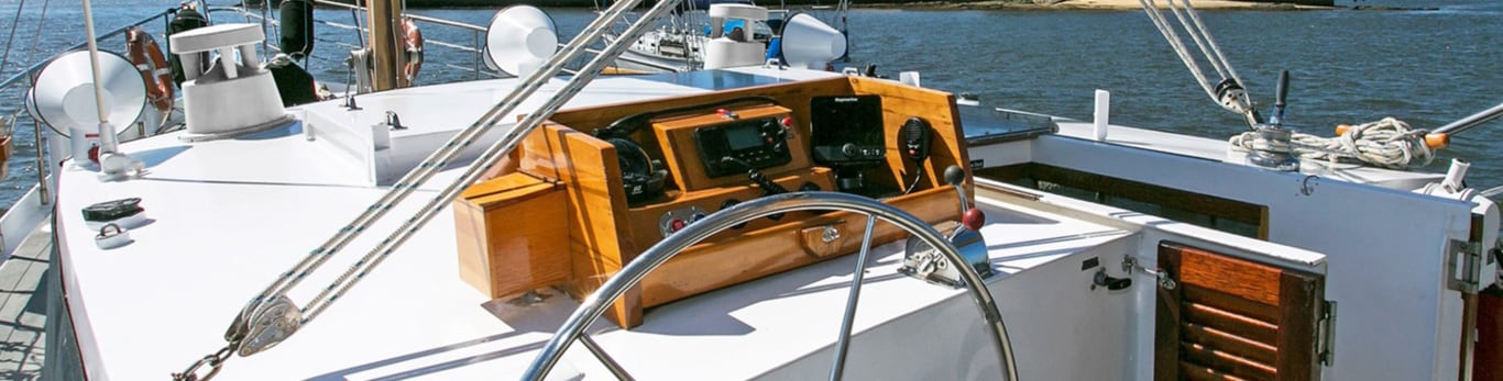 The helm of Sydneysider charter vessel cruising on Sydney Harbour