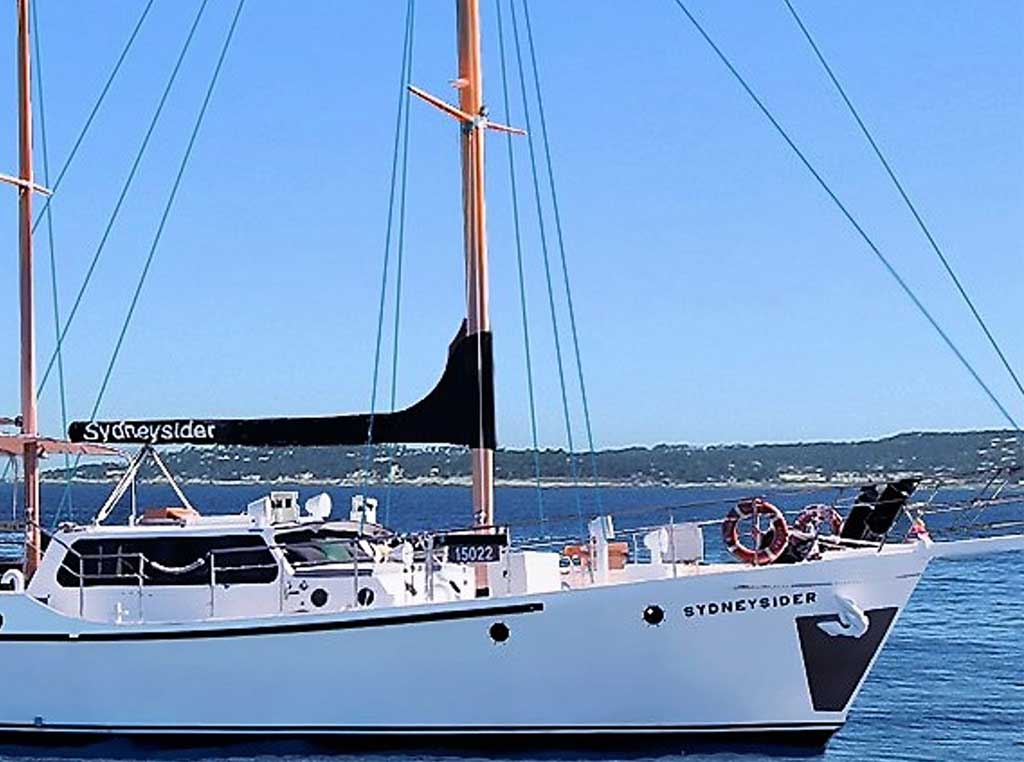 The bow of Sydneysider Charter Boat overlooking the Sydney Harbor