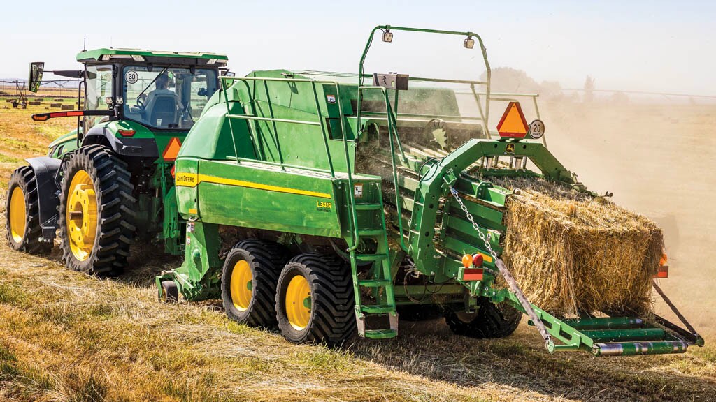 L341R High-Density Baler working in a field. 