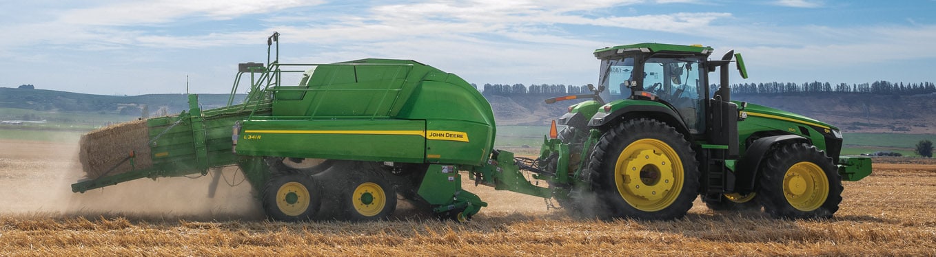 L341R High-Density Baler working in a field. 