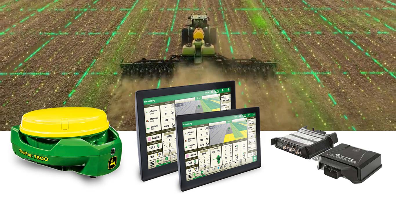 Receptor StarFire 7500, monitor universal G5, g5Plus universal, módem JDLink M y R, al fondo una máquina John Deere en el campo.