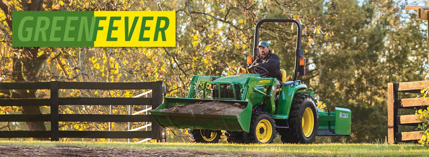 Green Fever Power Pac Inc. Marshfield Wisconsin 3032e tractor going through open fence - Green Fever Power Pac Inc. Marshfield Wisconsin