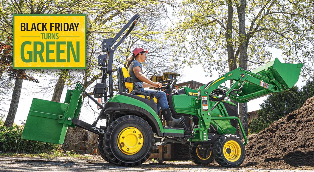 a woman operating a 1025R in a forest with an overlaying Black Friday Turns Green text banner
