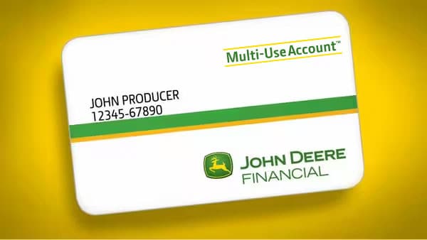 White John Deere Financial card with Multi-Use Account logo on it