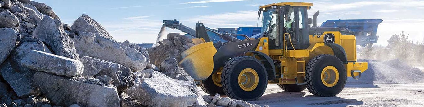 644 X-Tier Wheel Loader hauls a load of concrete