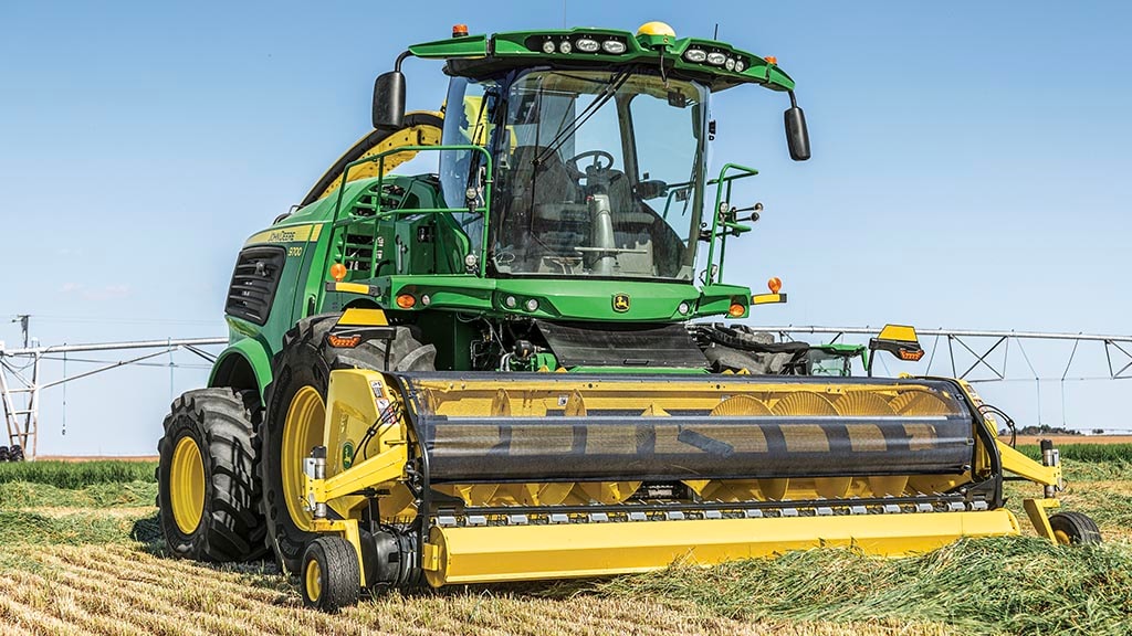 46R picking up hay in a field