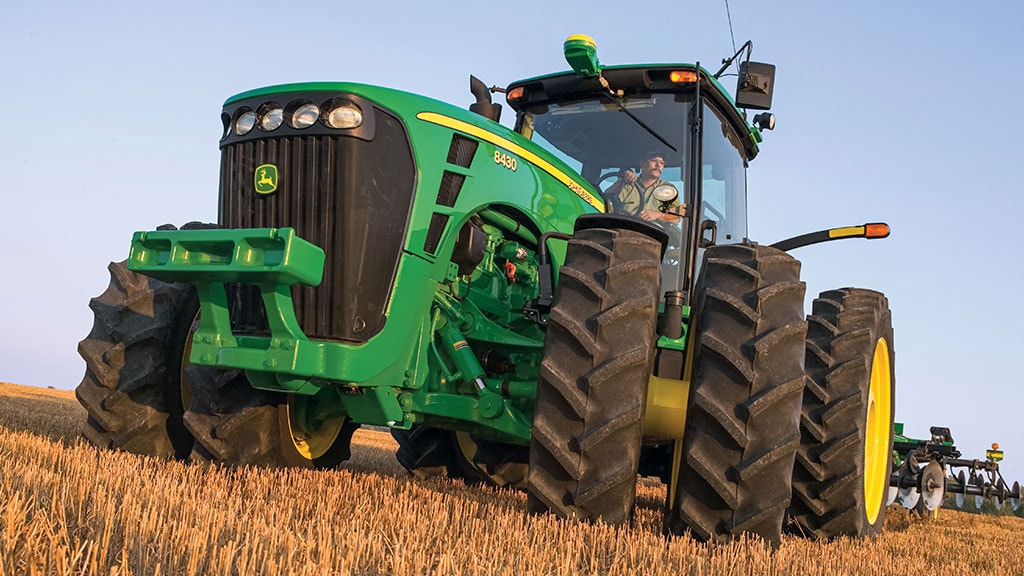 John Deere 8430 tractor in soybean stubble.